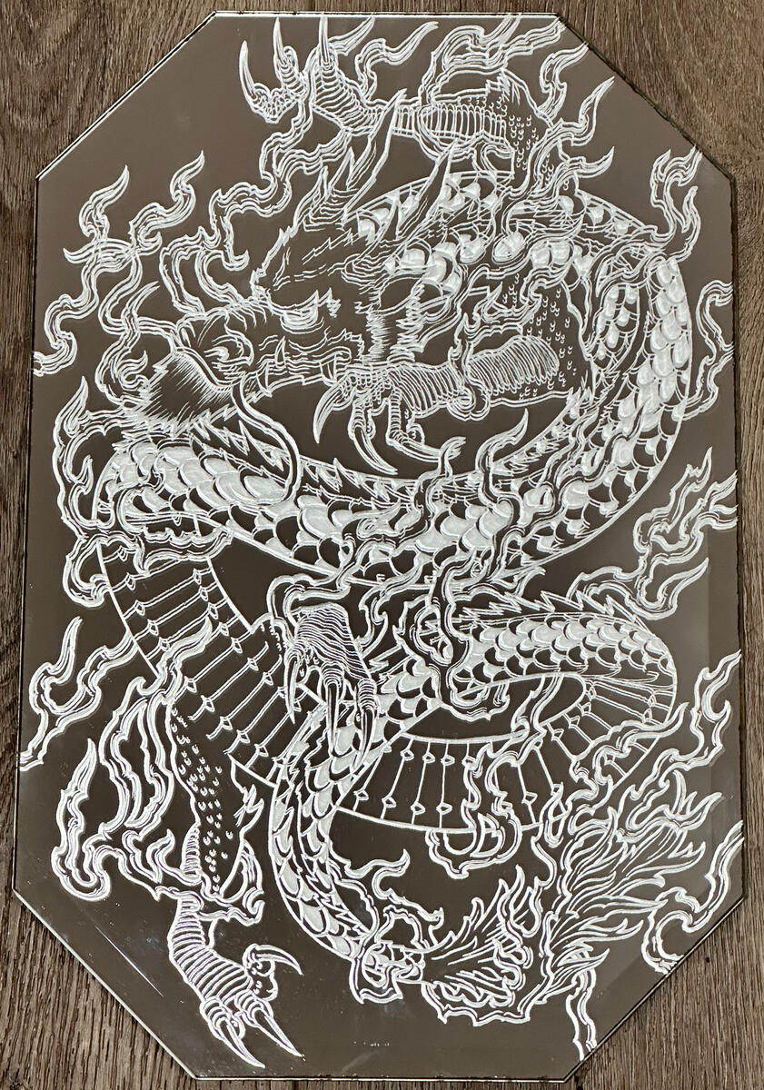Dragon. Engraved mirror.