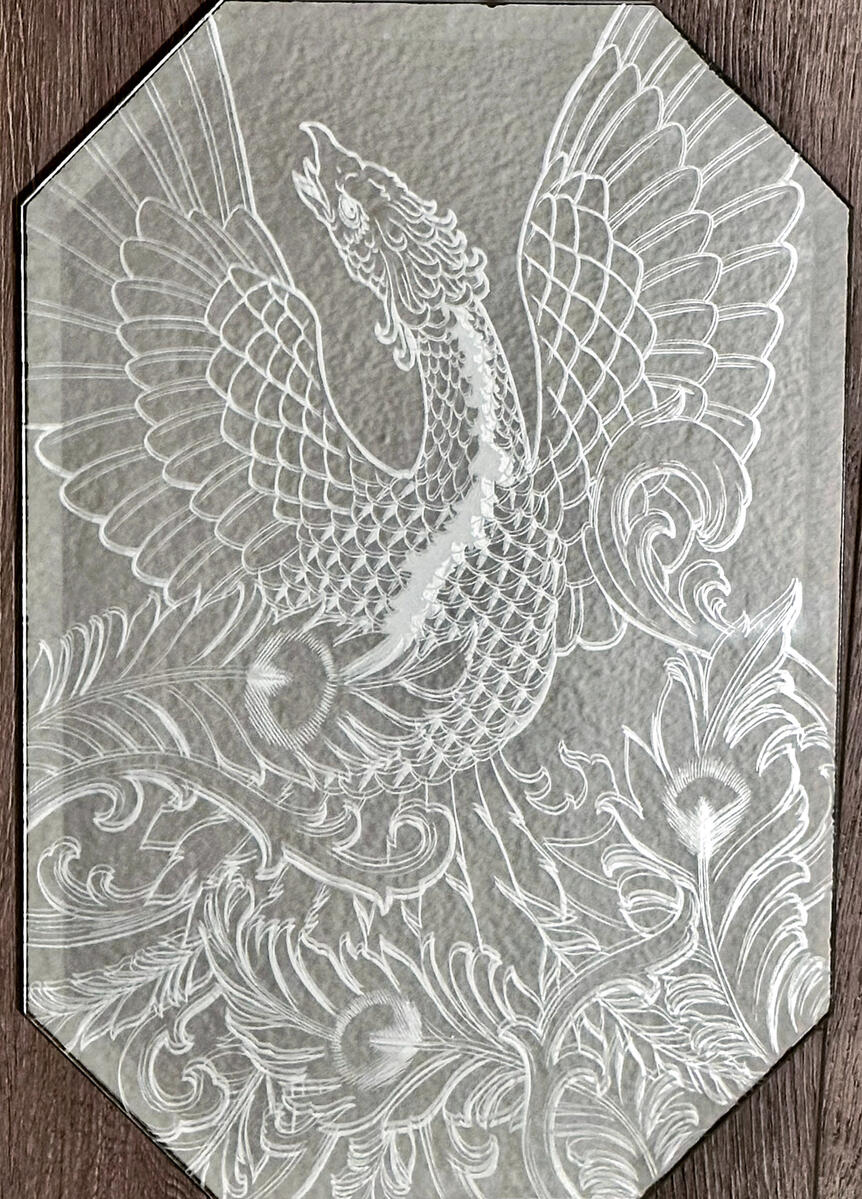 Phoenix. Engraved mirror.